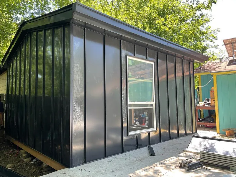 Black standing seam metal wall panels for Roof Inspection in Highland Heights